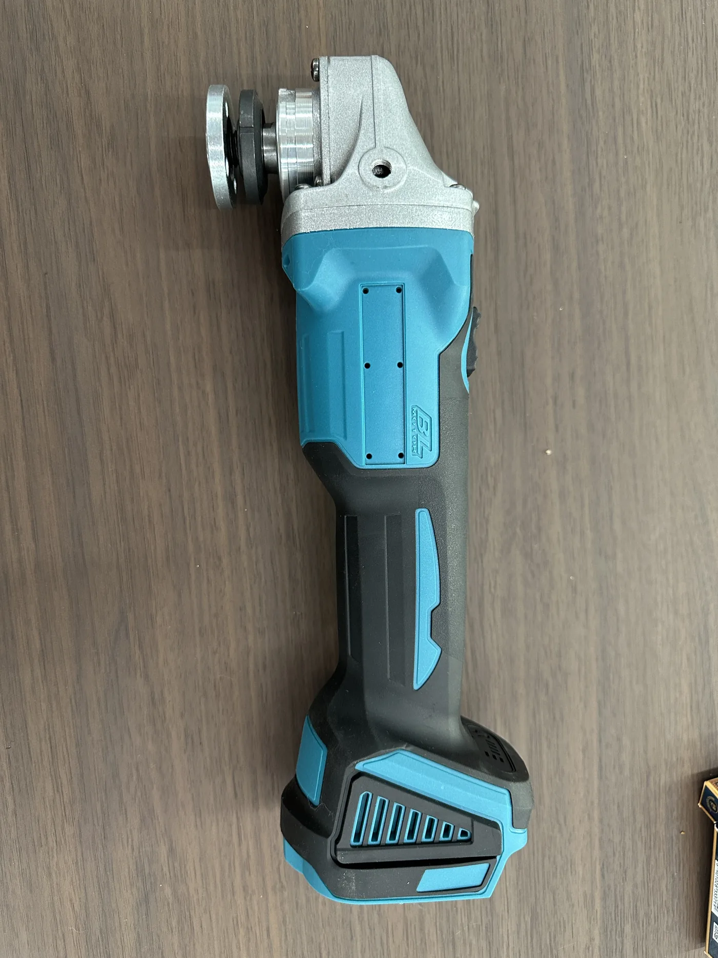 Cordless Angle Grinder — 21 V, 100 / 125 mm — 21 V · 100 / 125 mm